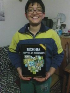 Boris' holding a Bible