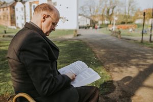 Cameron reading the Accessible Bible