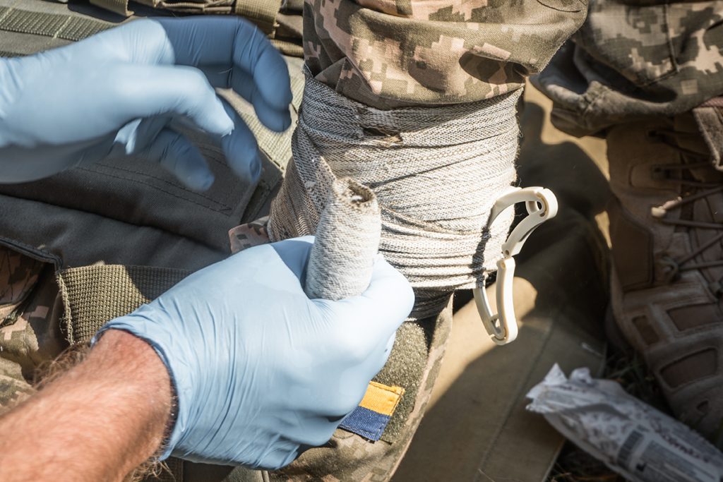 Bandaging a Ukraine Solider's injured hand